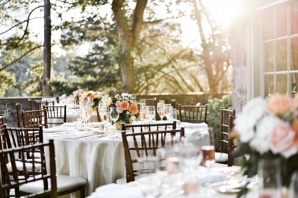 Sunlit outdoor wedding reception in the summer