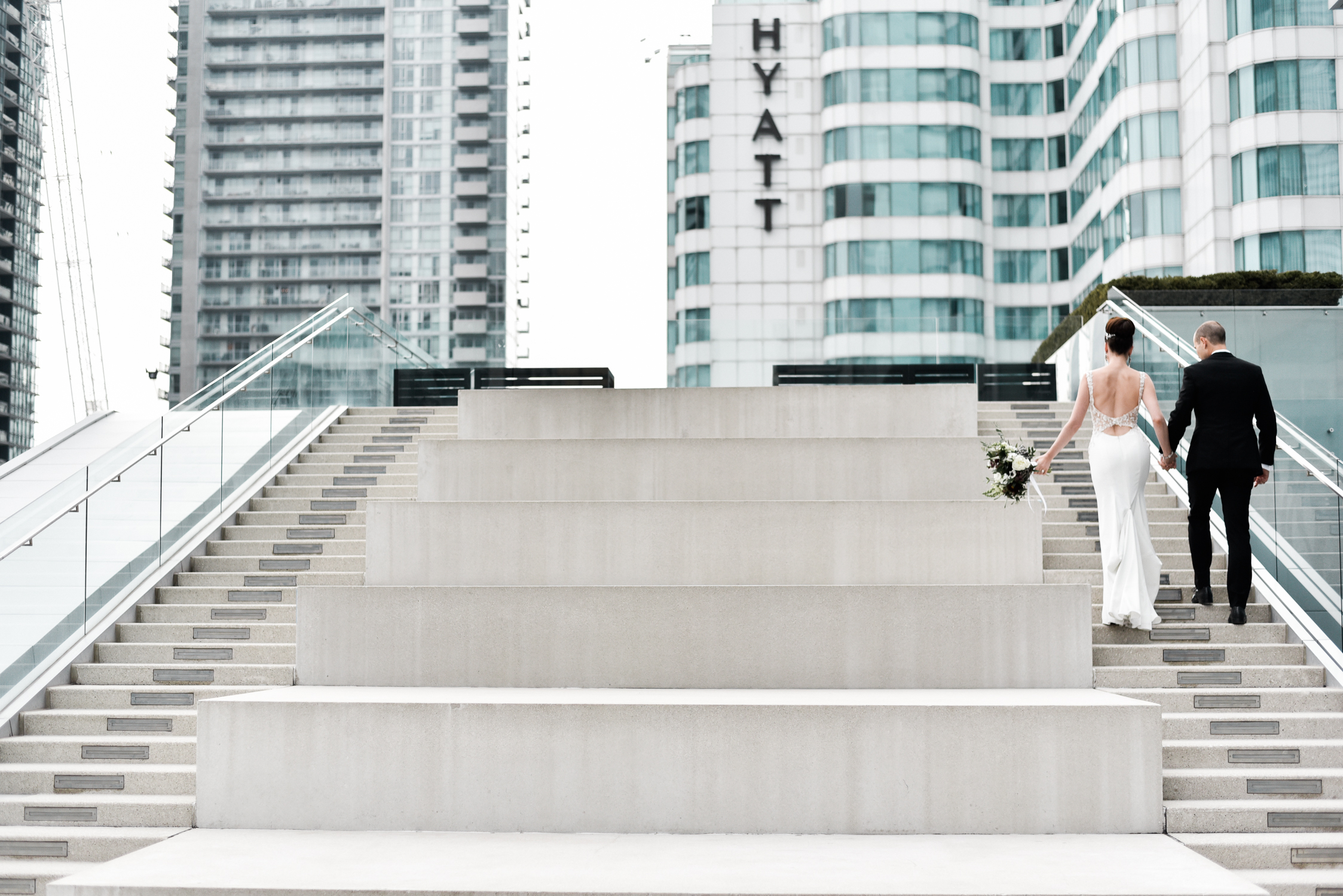 Photo of bride and groom on stairs on Malaparte by Alix Gould