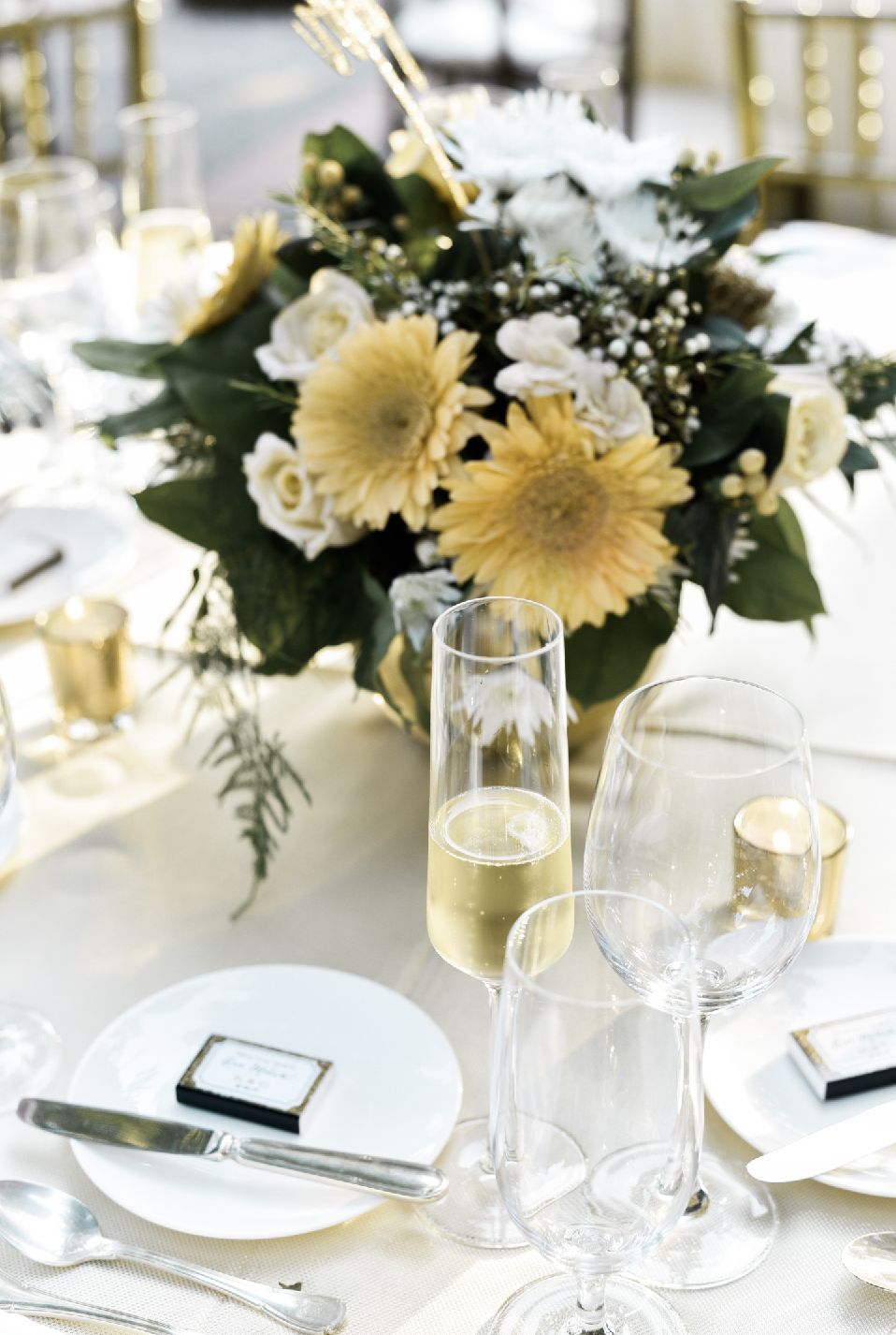 Gold and yellow flowers with champagne