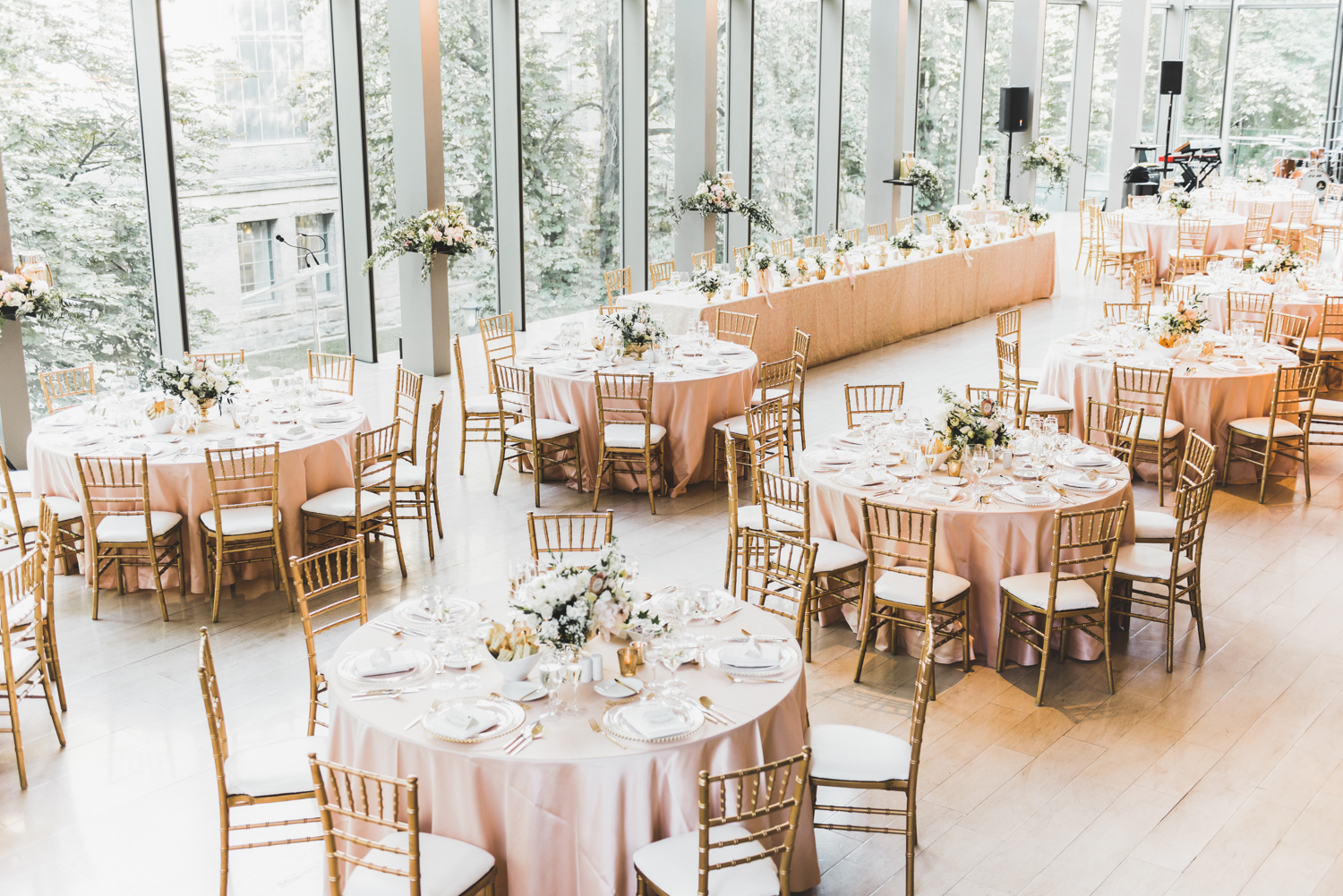 Blush tables and gold accents at this beautiful summer wedding at RCM