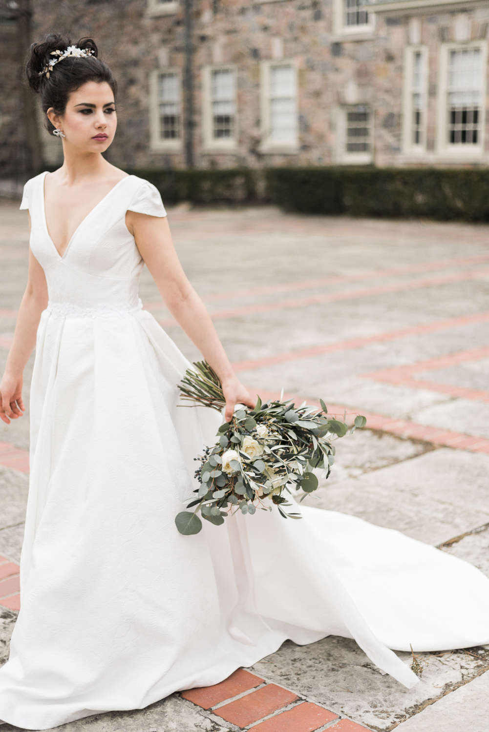 Bride in Catherine Langlois gown with Cool Green and Shady flower bouquet