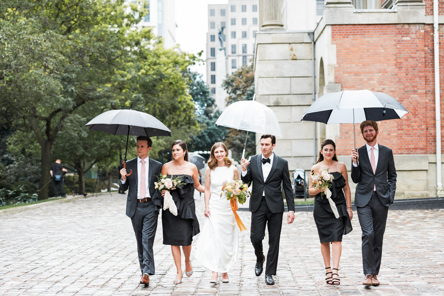 Bridal Party in the rain at Osgoode Hall