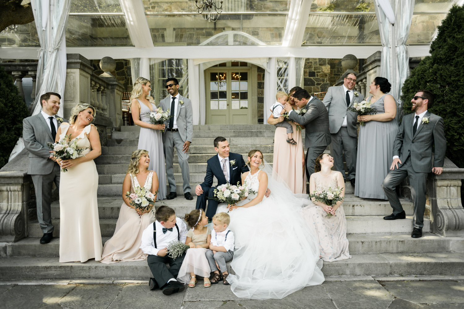 Bridal party on the steps of the Graydon Hall terrace