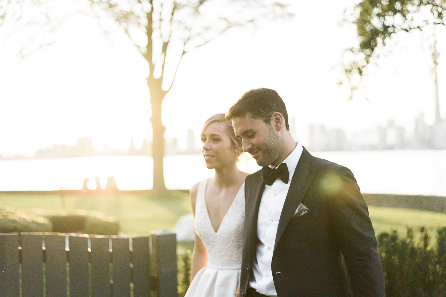 Bride and groom at sunset at their summer RCYC wedding on Toronto Island