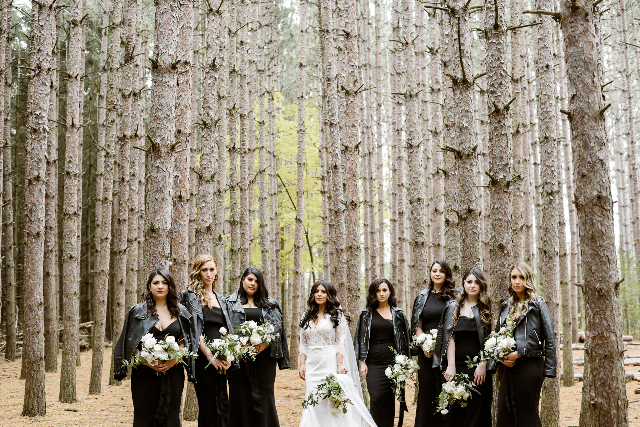 The most stunning bridesmaids wearing black leather jackets at Kortright Centre