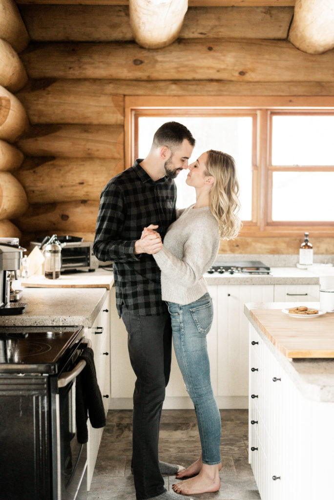 Engagement photos in a cottage kitchen