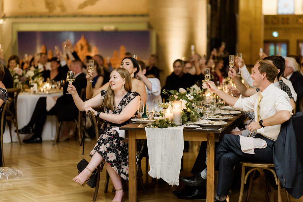 Wedding at the Royal Ontario museum, guests cheers